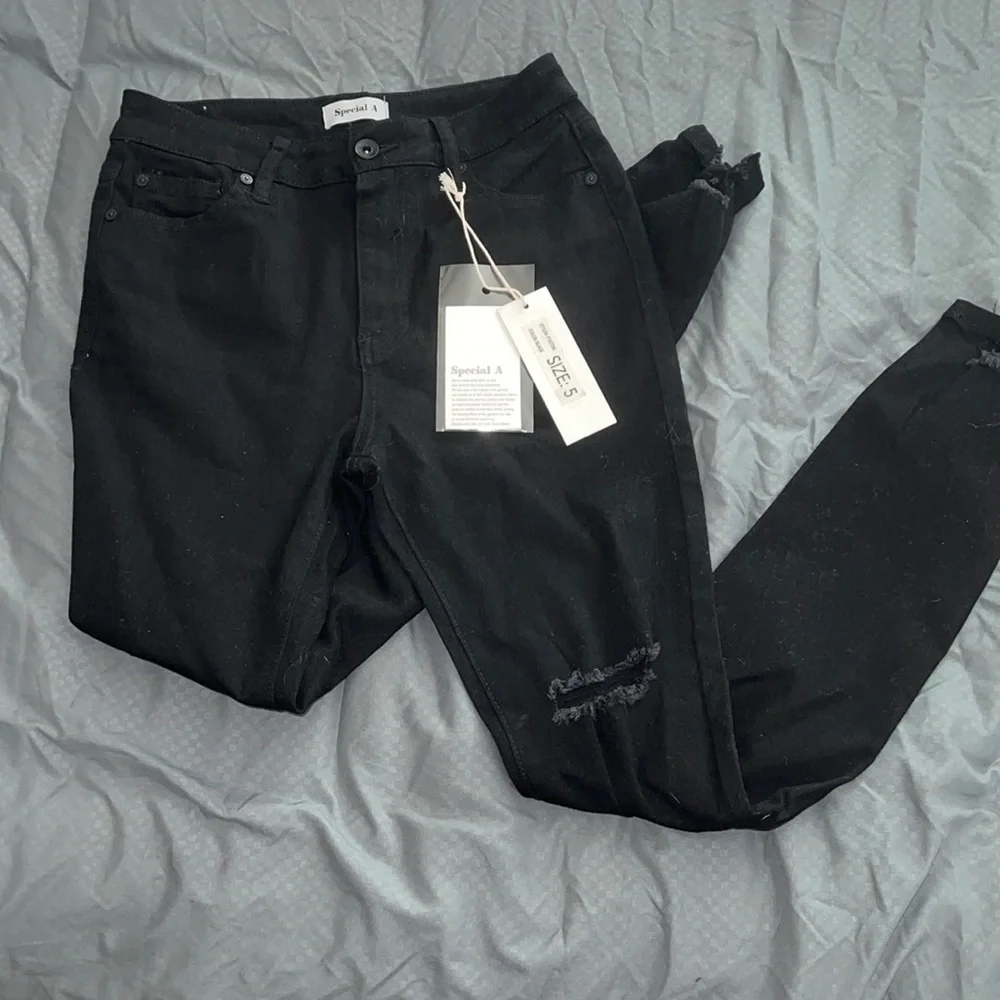 Special A Size 5 slight Distressed stretchy jeans